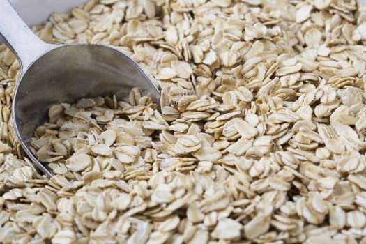 Healthy raw oats with scoop