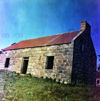 Color film image of old abandoned house in Templand