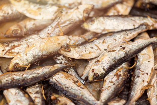 Fresh crispy fried Smelts in the pan. Close-up.