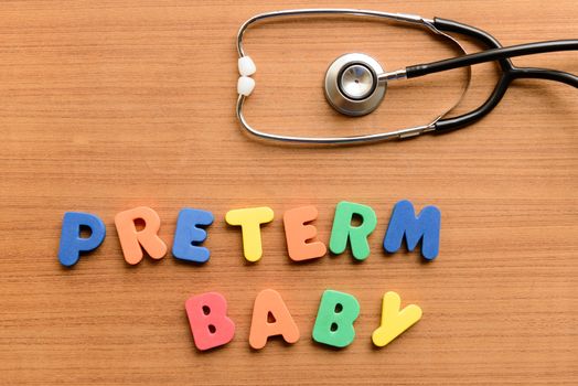 Preterm baby colorful word on the wooden background