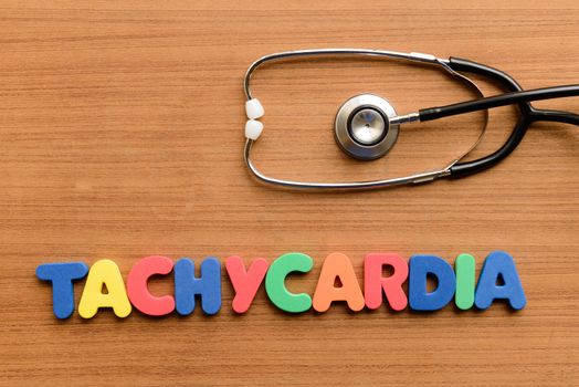 Tachycardia colorful word on the wooden background