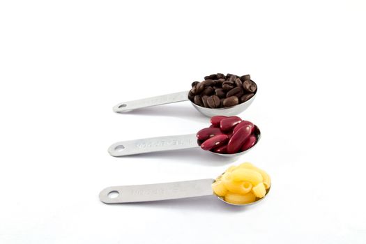 Coffee rad beans and macaroni, measure spoon 