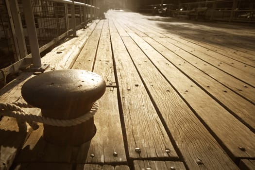 Bollard on pier on sunset, Larnaca. Cyprus