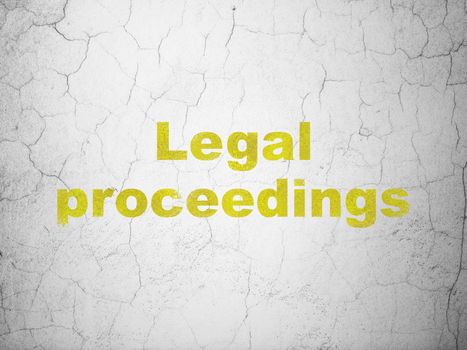 Law concept: Yellow Legal Proceedings on textured concrete wall background