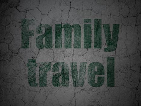 Vacation concept: Green Family Travel on grunge textured concrete wall background