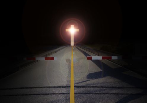 Red barricade at stop area with crucifix or cross at the end of road ,barrier or blackade with long road with crucifix light in darkness