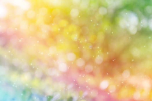 Dreamy colourful rainbow colour bokeh and lens flare romantic mood abstract sparkle glitter fancy background