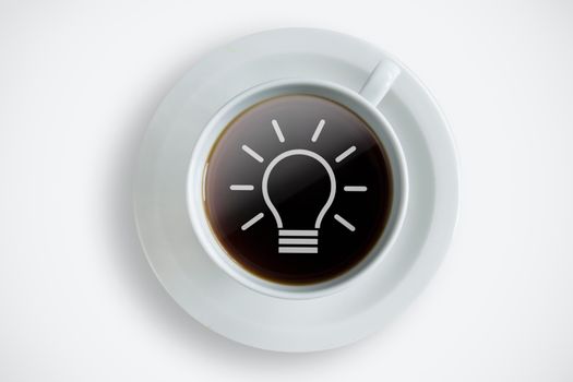 Fresh cup of coffee with idea bulb symbol in the middle 