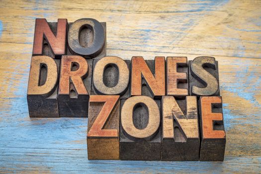 No drones zone sign or banner - word abstract in vintage letterpress wood type blocks