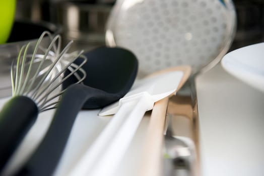 the Various tableware on shelf in the kitchen