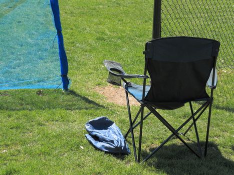 Outdoor Sports Chair with beverage holder for the local sports fan on a sunny day.