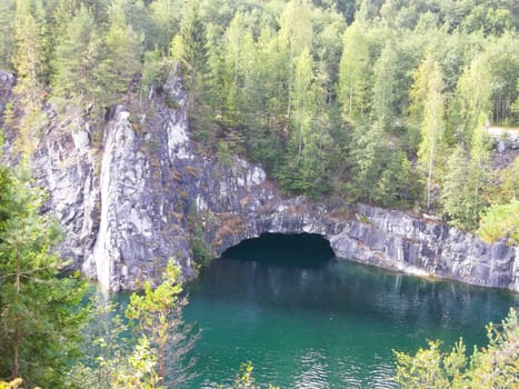 underwater cave on the river among the rocks