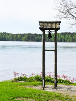 the bell river on the background of forest and blue sky