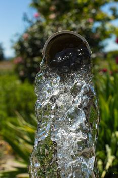 Water flowing from a well pipe