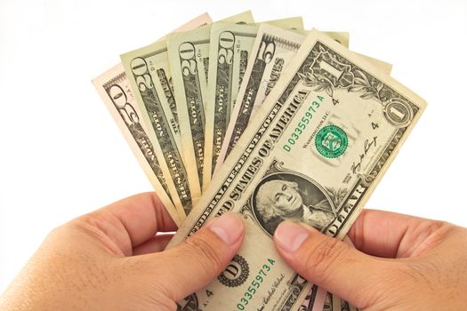 Hand holding money dollars isolated on white background 
