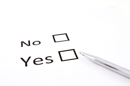 Check boxes and pen isolated on the white 