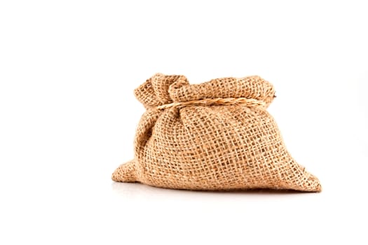 small burlap sack isolated on white background 