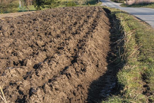 Freshly plowed field, field in Germany.