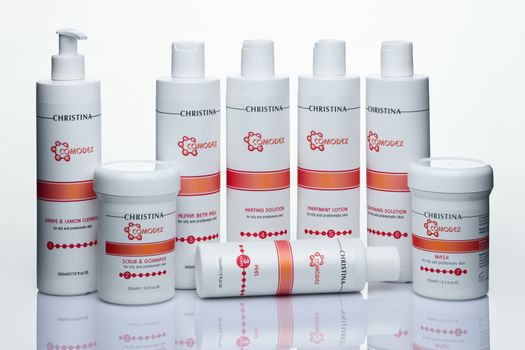 Set of cosmetics for care skin in plastic bottles on a white background, Israel