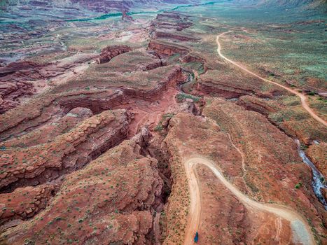aerial view of a creek and road in canyon country near Moab, Utah