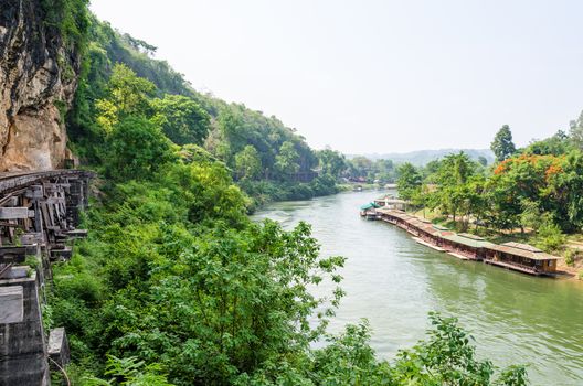 Beautiful landscape Kwai Noi river under Death Railway bridge and floating resort at Krasae cave in Kanchanaburi province Thailand