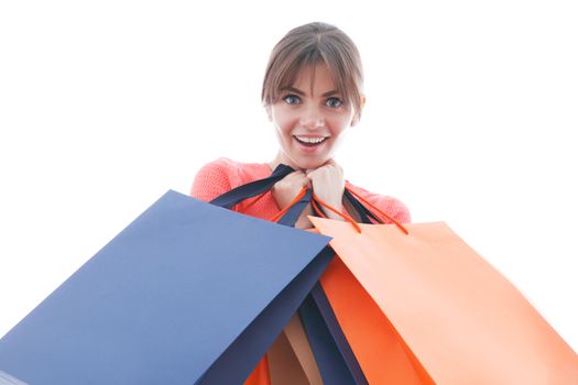 Woman with shopping bags isolated on white background