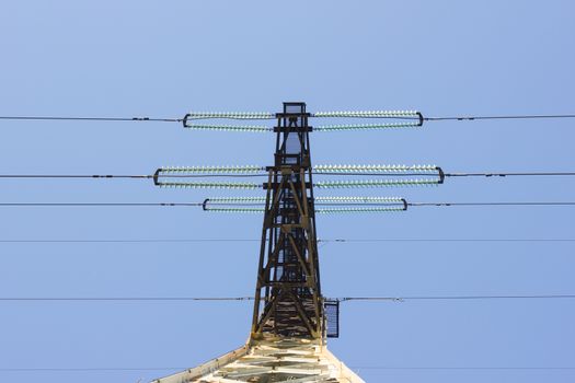 electric insulator on the background of blue sky