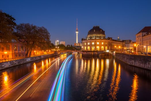 Berlin River Spree and famous round Bode Museum at twilight with TV Tower (Fernsehturm)