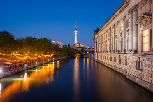 Berlin's River Spree, TV Tower, and side of the Bode Museum at dusk