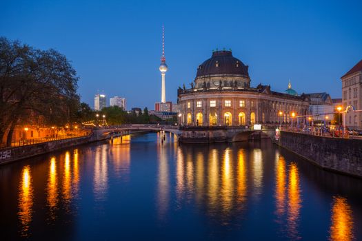 Berlin River Spree and famous round Bode Museum at twilight with TV Tower (Fernsehturm)