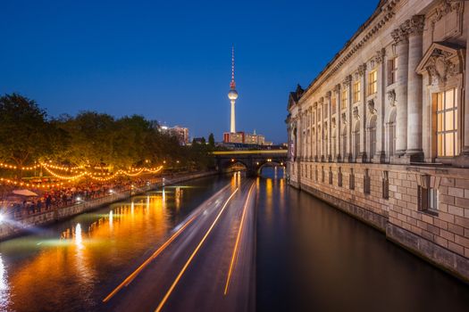 Berlin's River Spree, TV Tower, and side of the Bode Museum at dusk