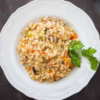 The vegetable risotto is a first healthy and nutritious dish suitable for vegetarians