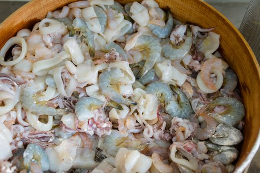 mixed fried fish, with squid, blue fish, chips and lemon