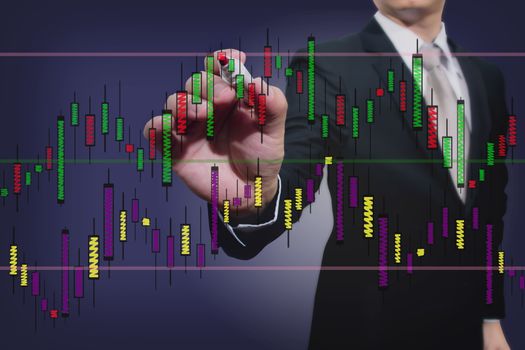  businessman drawing a stock  graph 