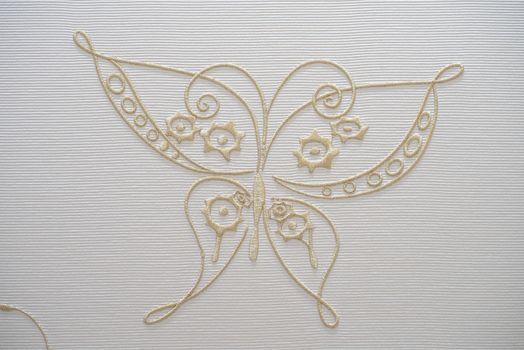 Embroidery butterfly on cotton background