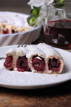 a piece of shortcrust  dough   stuffed with cherries