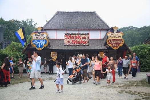 Concession booth and patrons at the New York Renaissance Faire Festival.