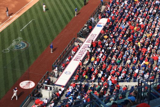 Home team dugout and fans at Citizens Bank Park, home of the Philadelphia Phillies.