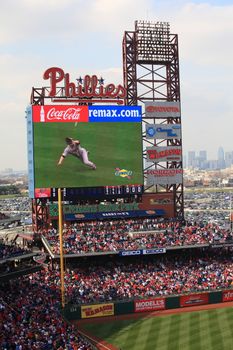 Diving catch on the scoreboard at Citizens Bank Park, home of the Philadelphia Phillies.
