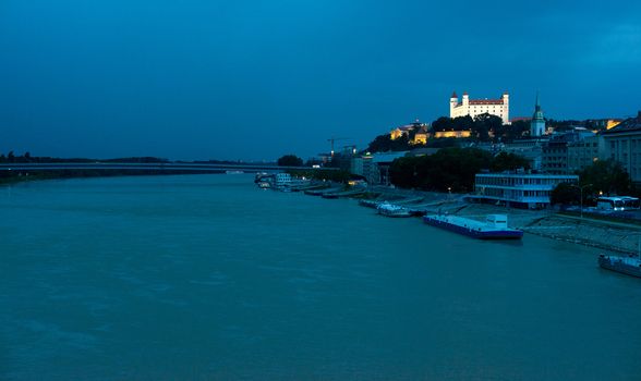 Bratislava castle above Danube river at dusk, Slovakia