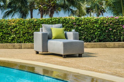 Water resistant outdoor sofa chair with cushions and pillows