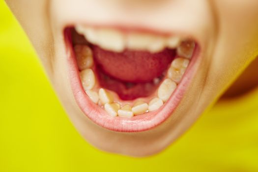 First and second teeth of the little boy