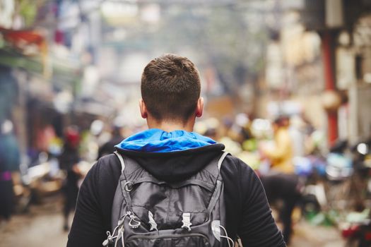 Young traveler with back pack - Hanoi, Vietnam 