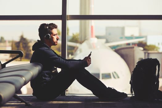 Young traveler is waiting at the airport