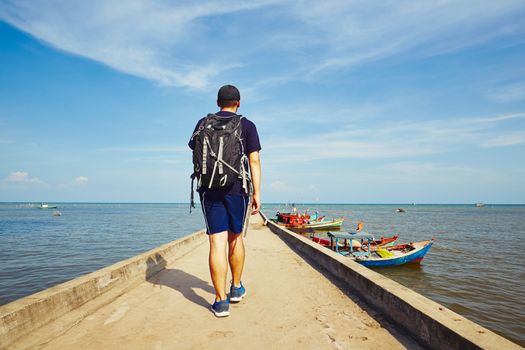 Young traveler with bag pack traveling in Asia