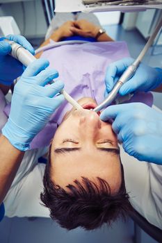 Dentist office - young man in the dentist chair