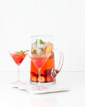 Delicious cocktail made with fresh chrries and peaches.