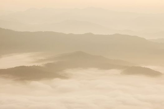 Beautiful morning with fog between hills at Doi Samer Dao in Si Nan National Park , High mountain in Nan province, Thailand