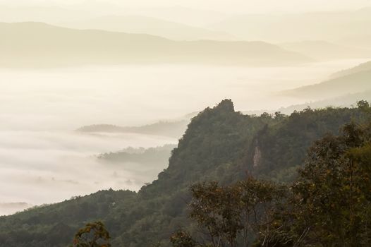 Beautiful morning with fog between hills at Doi Pha Chu in Si Nan National Park , High mountain in Nan province, Thailand