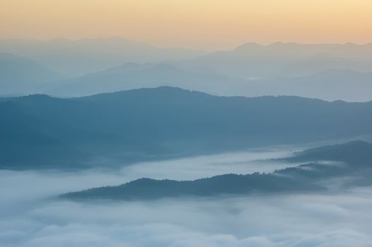 Beautiful morning with fog between hills at Doi Samer Dao in Si Nan National Park , High mountain in Nan province, Thailand